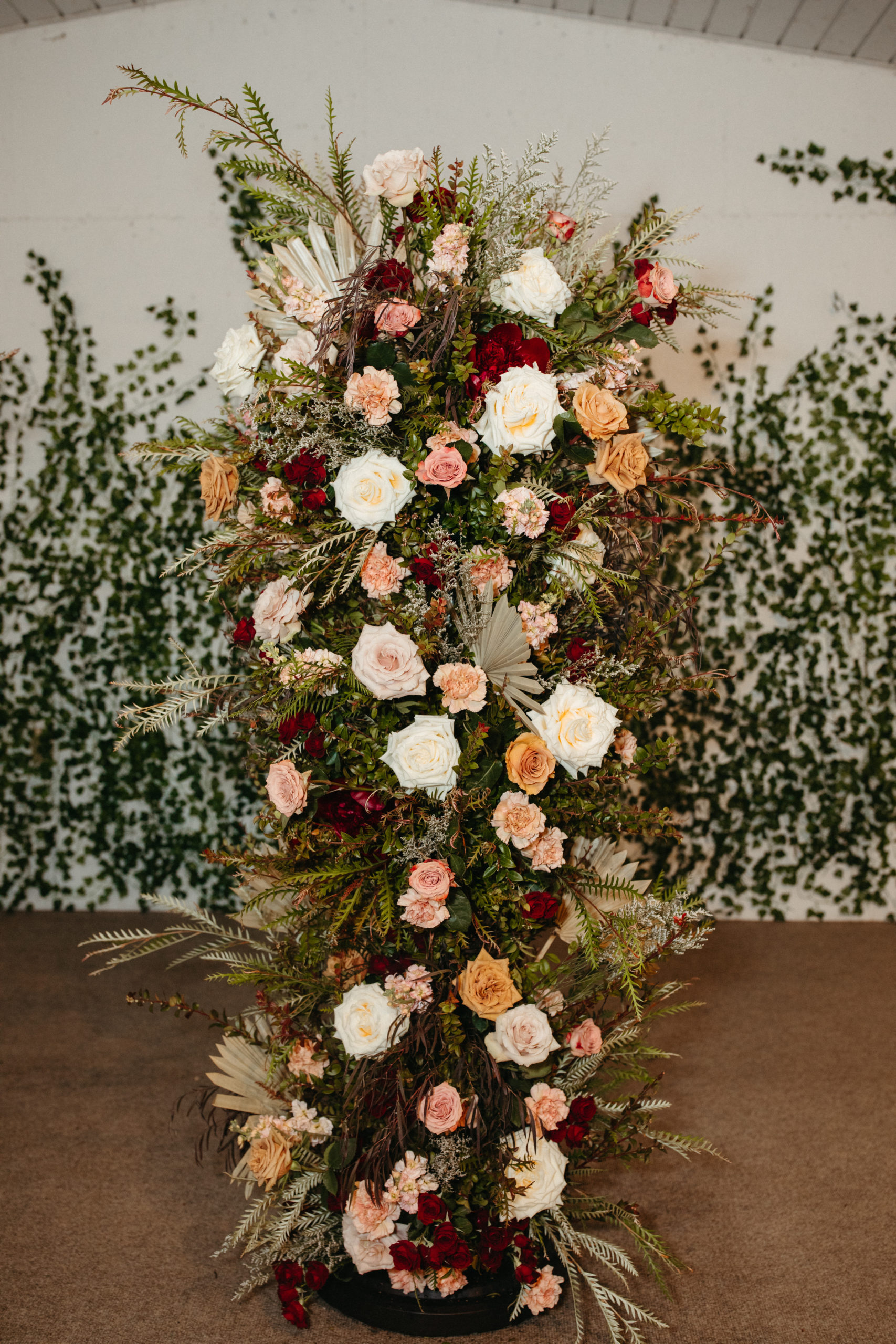 floral pillar design by Sweet Beets floral for great lakes michigan wedding