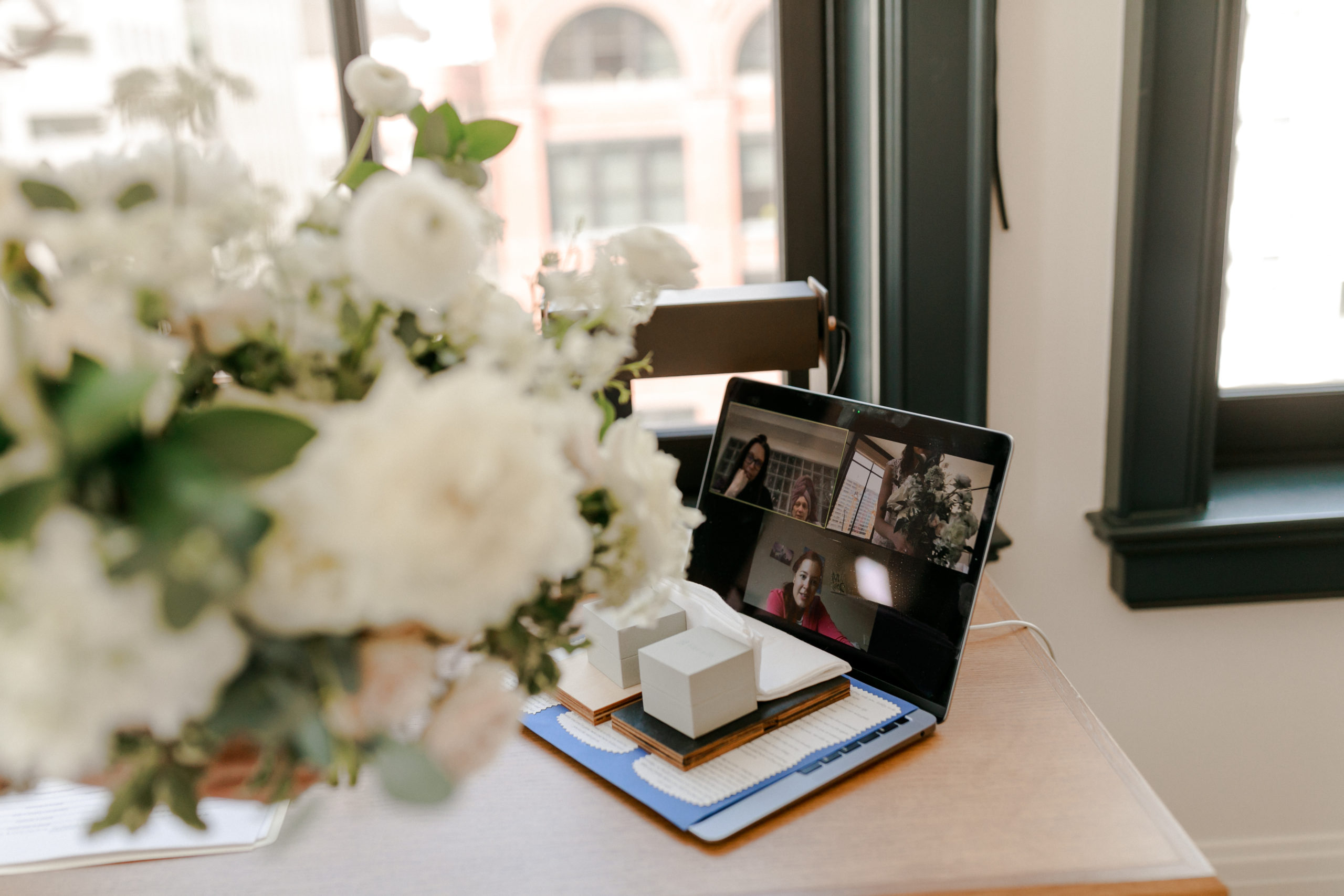 bride on a zoom call during covid elopement wedding in Detroit, Michigan